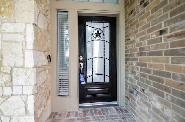25619 Tower Side Ln, Katy, TX 77494 - property entrance with stone siding
