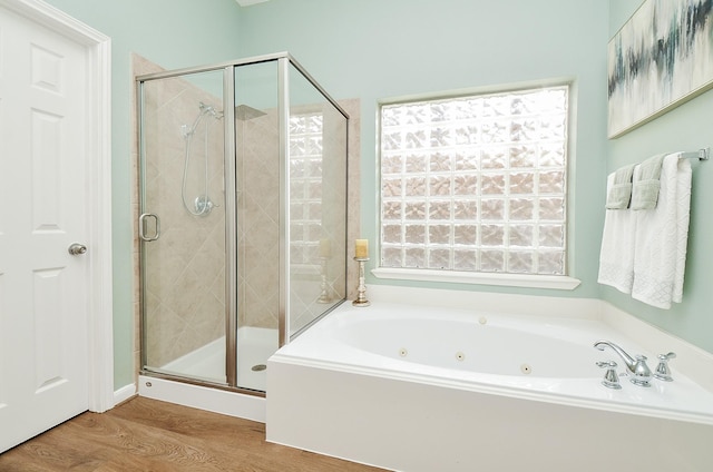 25619 Tower Side Ln, Katy, TX 77494 - full bathroom with a tub with jets, plenty of natural light, a stall shower, and wood finished floors