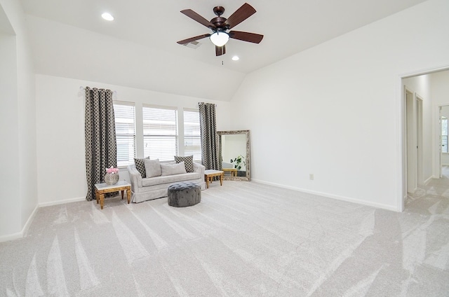 25619 Tower Side Ln, Katy, TX 77494 - living area featuring light colored carpet, a ceiling fan, lofted ceiling, and recessed lighting