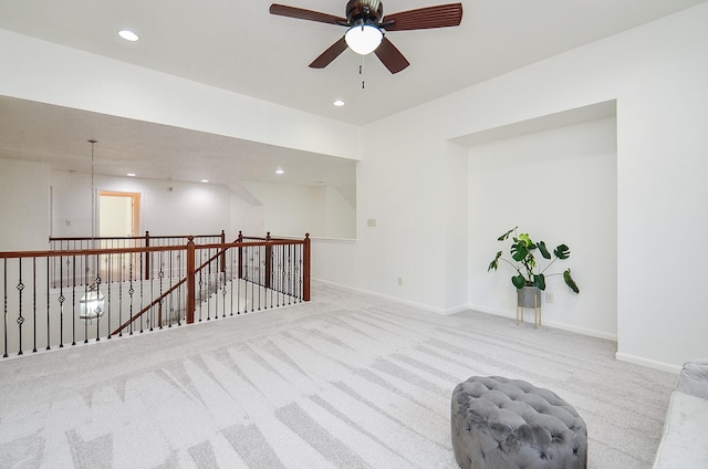 25619 Tower Side Ln, Katy, TX 77494 - unfurnished room featuring carpet floors, ceiling fan, an upstairs landing, and recessed lighting