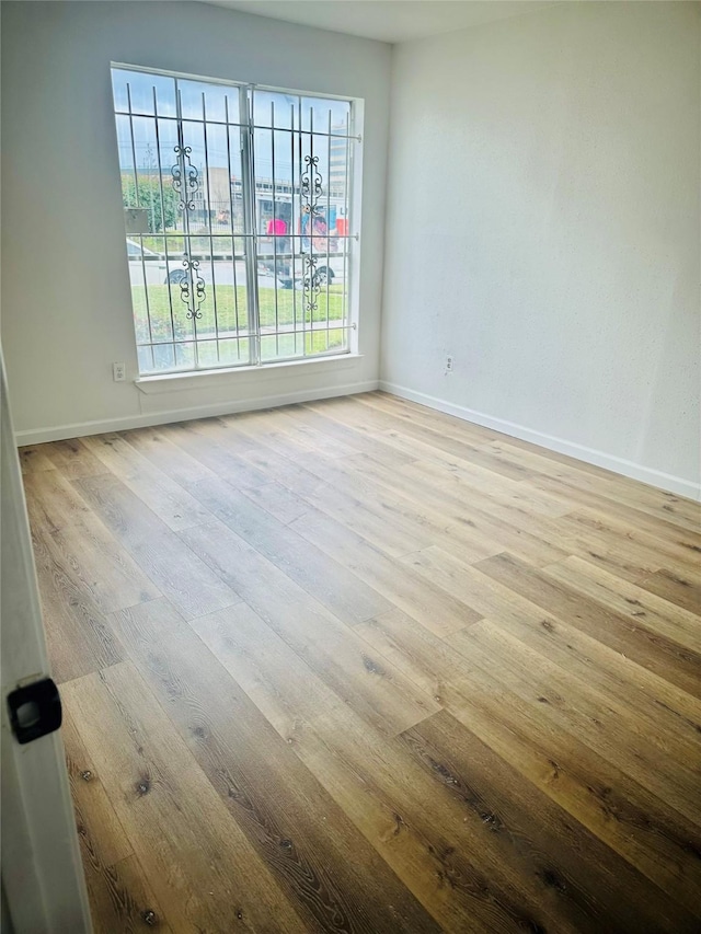 9350 Country Creek Dr Unit 58, Houston, TX 77036 - unfurnished room with wood finished floors