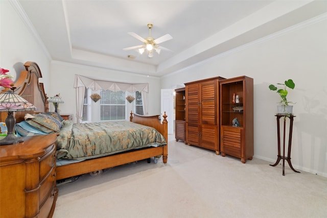 7311 Open Oak Way, Humble, TX 77346 - bedroom featuring a raised ceiling, carpet, crown molding, and a ceiling fan