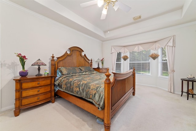 7311 Open Oak Way, Humble, TX 77346 - carpeted bedroom with a raised ceiling and ceiling fan