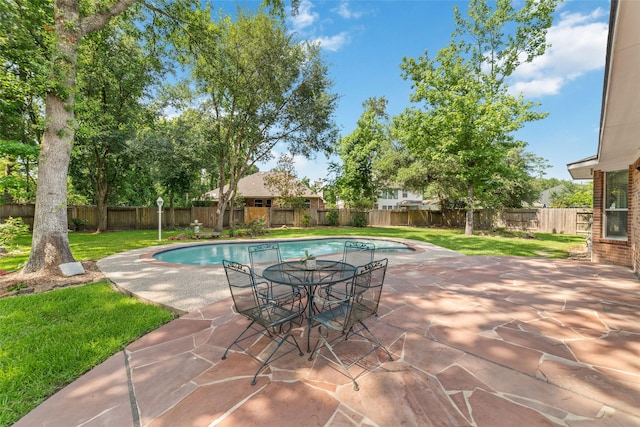 7311 Open Oak Way, Humble, TX 77346 - view of pool featuring a fenced backyard, a patio, and outdoor dining area