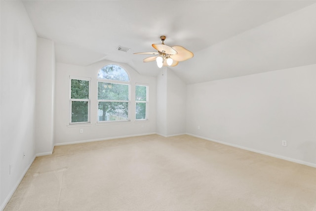 31 S Creekmist Pl, Conroe, TX 77385 - spare room with lofted ceiling, light colored carpet, and a ceiling fan