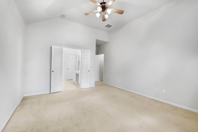 31 S Creekmist Pl, Conroe, TX 77385 - unfurnished bedroom with vaulted ceiling, light carpet, ceiling fan, and connected bathroom
