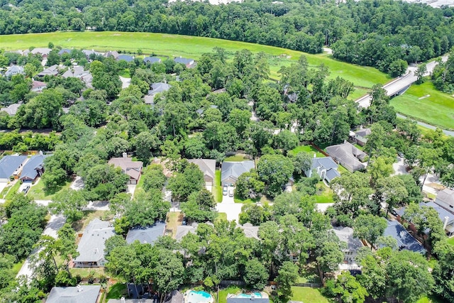 31 S Creekmist Pl, Conroe, TX 77385 - aerial perspective of suburban area with a tree filled landscape