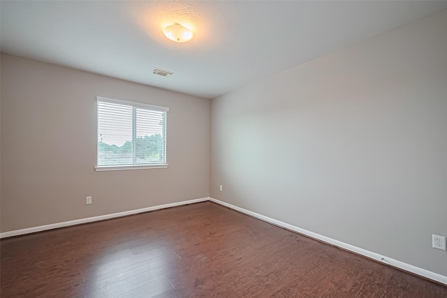 19819 Sternwood Manor Dr, Spring, TX 77379 - spare room featuring dark wood-style floors and baseboards