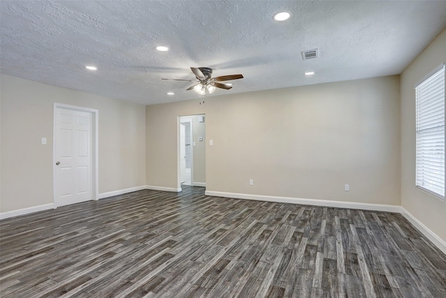 515 Main St, Pasadena, TX 77506 - spare room featuring dark wood-style flooring, a ceiling fan, recessed lighting, and a textured ceiling