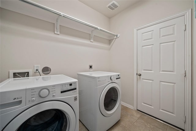 4831 Sunset Park Ln, Rosharon, TX 77583 - laundry area with washer and dryer and baseboards
