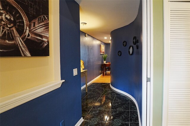 4004 Montrose Blvd Unit 45A, Houston, TX 77006 - hallway with marble look tile flooring and recessed lighting