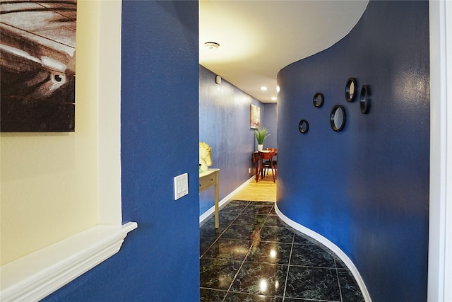 4004 Montrose Blvd Unit 45A, Houston, TX 77006 - hallway featuring marble finish floors and baseboards