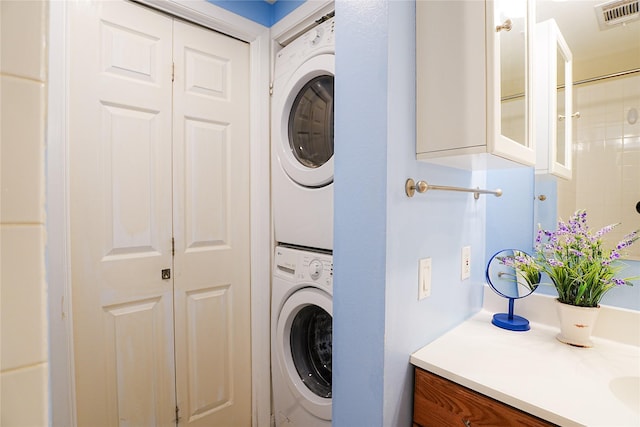 4004 Montrose Blvd Unit 45A, Houston, TX 77006 - washroom featuring stacked washer / dryer