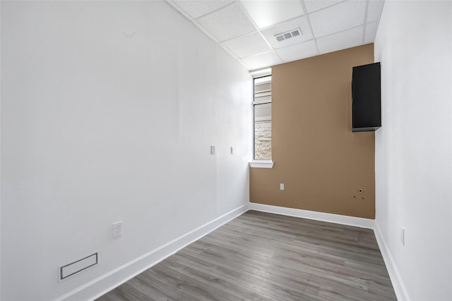 440 Cobia Dr Unit 1804, Katy, TX 77494 - spare room with a drop ceiling and wood finished floors