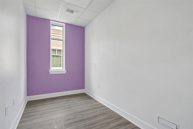 440 Cobia Dr Unit 1804, Katy, TX 77494 - spare room with a drop ceiling and wood finished floors