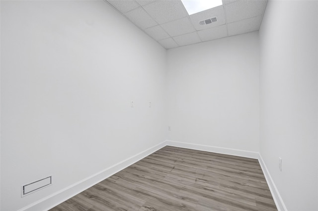 440 Cobia Dr Unit 1804, Katy, TX 77494 - spare room with a paneled ceiling and wood finished floors
