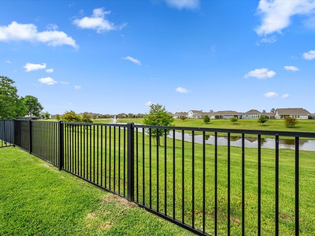 15754 Cairnwell Bend Dr, Humble, TX 77346 - view of yard with a residential view and a water view