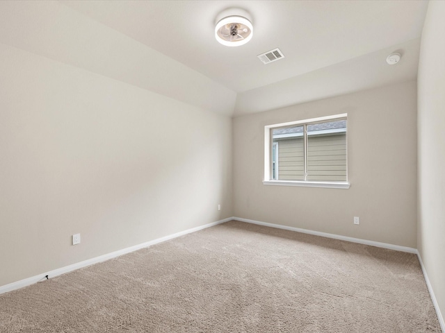 15754 Cairnwell Bend Dr, Humble, TX 77346 - carpeted empty room featuring a smoke detector and vaulted ceiling