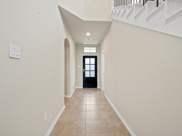 15754 Cairnwell Bend Dr, Humble, TX 77346 - entryway with arched walkways, light tile patterned flooring, and recessed lighting