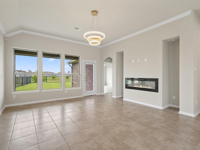 15754 Cairnwell Bend Dr, Humble, TX 77346 - unfurnished living room with a chandelier, crown molding, arched walkways, light tile patterned floors, and a glass covered fireplace