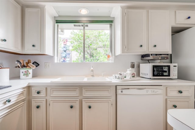 14110 Woodnook Dr, Houston, TX 77077 - kitchen with white appliances, light countertops, and white cabinets