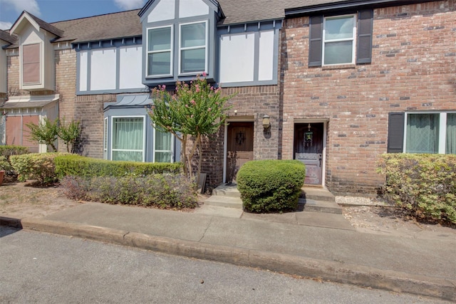 840 Threadneedle St E Unit 208, Houston, TX 77079 - view of front of property with brick siding and roof with shingles