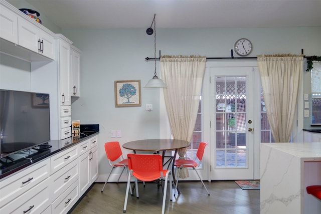 840 Threadneedle St E Unit 208, Houston, TX 77079 - dining room with dark wood-type flooring