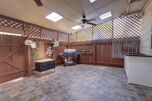 840 Threadneedle St E Unit 208, Houston, TX 77079 - view of patio / terrace with ceiling fan, a grill, and a gate
