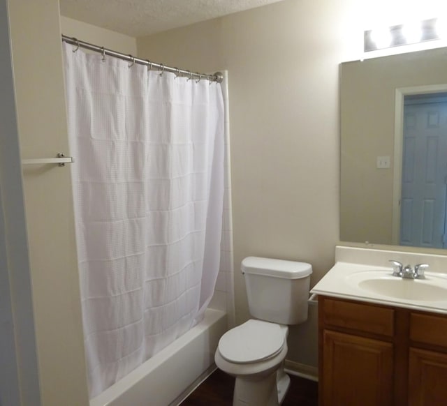 21606 Haylee Way, Humble, TX 77338 - bathroom featuring vanity, shower / tub combo with curtain, and a textured ceiling