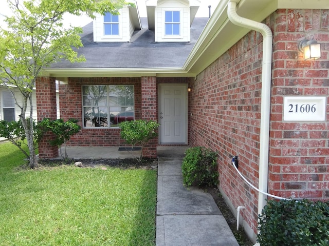 21606 Haylee Way, Humble, TX 77338 - entrance to property with brick siding and a yard