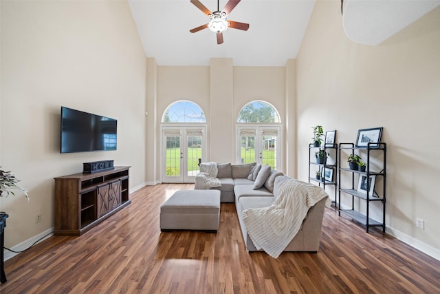 15590 Crown Oaks Dr, Montgomery, TX 77316 - living room featuring high vaulted ceiling, a ceiling fan, french doors, and dark wood-type flooring