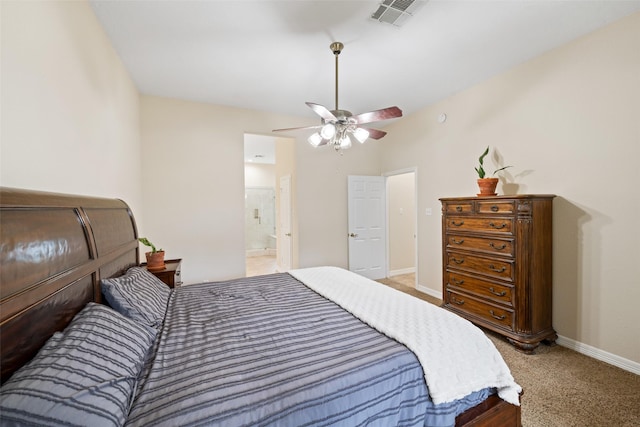 15590 Crown Oaks Dr, Montgomery, TX 77316 - bedroom with carpet, a ceiling fan, and ensuite bathroom