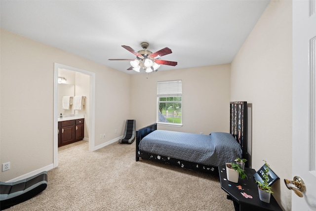 15590 Crown Oaks Dr, Montgomery, TX 77316 - bedroom featuring light colored carpet, ensuite bath, and ceiling fan