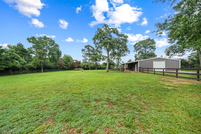 15590 Crown Oaks Dr, Montgomery, TX 77316 - view of yard featuring an outbuilding, a garage, and an outdoor structure