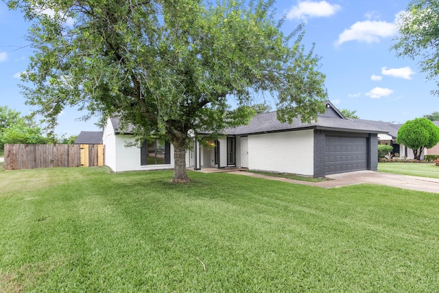 16234 Bowridge Ln, Houston, TX 77053 - view of front facade featuring driveway, a garage, roof with shingles, and brick siding