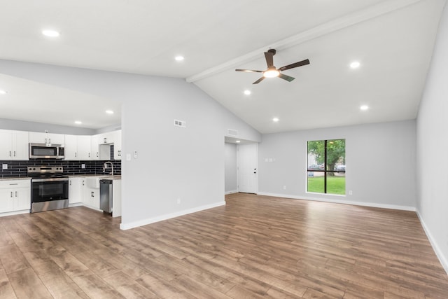 16234 Bowridge Ln, Houston, TX 77053 - unfurnished living room featuring ceiling fan, wood finished floors, and recessed lighting