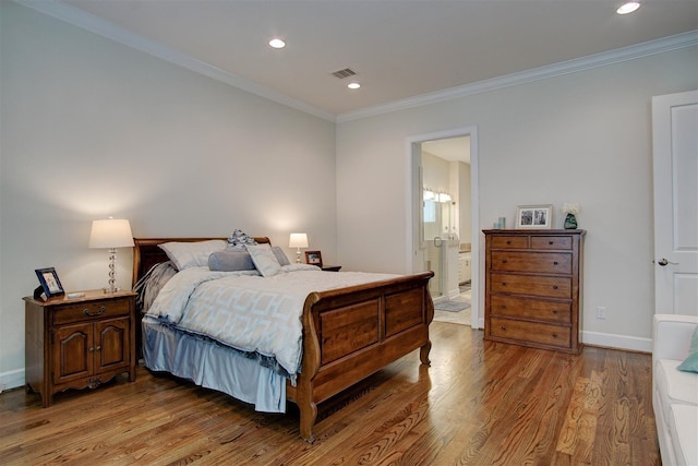 4314 Gibson St Unit B, Houston, TX 77007 - bedroom featuring crown molding, light wood-type flooring, recessed lighting, and ensuite bath