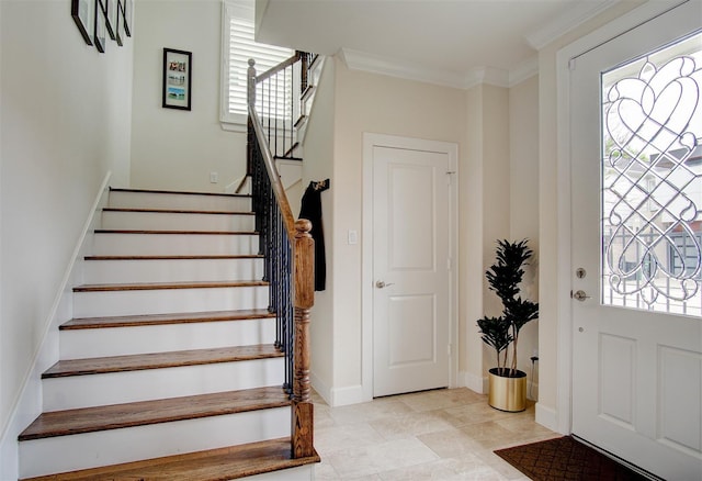 4314 Gibson St Unit B, Houston, TX 77007 - entryway featuring plenty of natural light, stairs, ornamental molding, and light tile patterned flooring