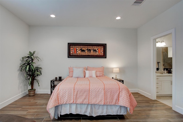 4314 Gibson St Unit B, Houston, TX 77007 - bedroom featuring wood finished floors, recessed lighting, and connected bathroom