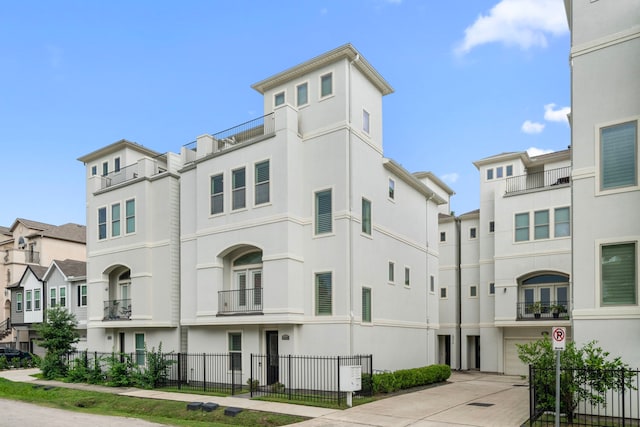 4314 Gibson St Unit B, Houston, TX 77007 - view of building exterior with driveway and a residential view