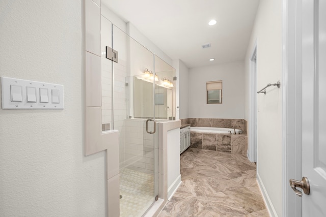 4314 Gibson St Unit B, Houston, TX 77007 - full bath featuring a bath, a stall shower, recessed lighting, and marble finish flooring
