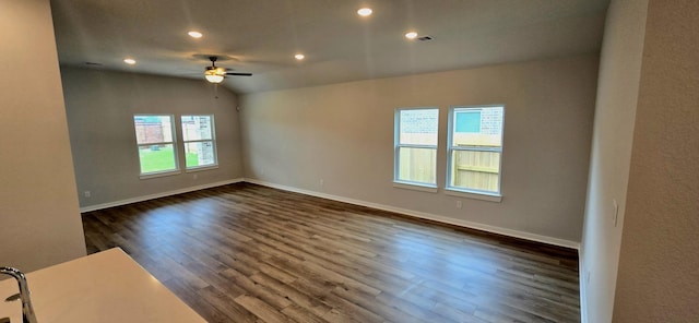 2556 Newport Breeze Dr, Katy, TX 77493 - spare room featuring a ceiling fan, dark wood-type flooring, recessed lighting, and vaulted ceiling