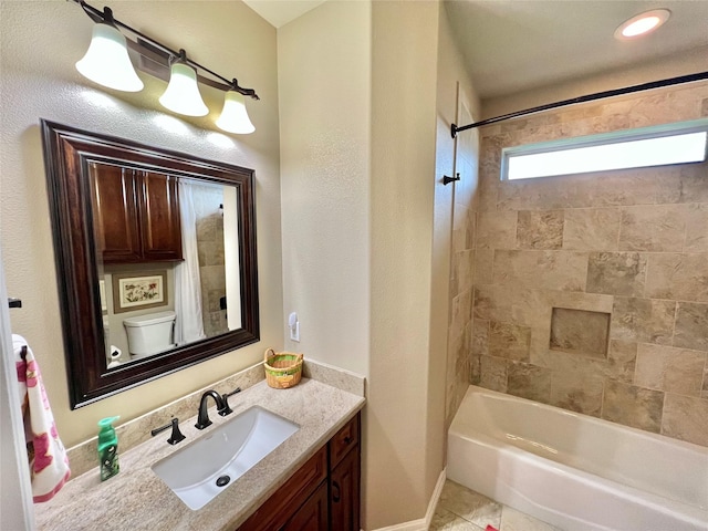 1464 S Bluebonnet Ln, Angleton, TX 77515 - bathroom with vanity, washtub / shower combination, and tile patterned floors