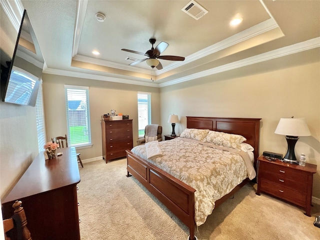 1464 S Bluebonnet Ln, Angleton, TX 77515 - bedroom featuring light colored carpet, a tray ceiling, ornamental molding, and a ceiling fan