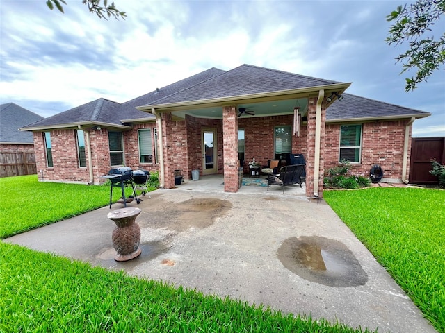 1464 S Bluebonnet Ln, Angleton, TX 77515 - back of house with a patio, a ceiling fan, a shingled roof, and brick siding