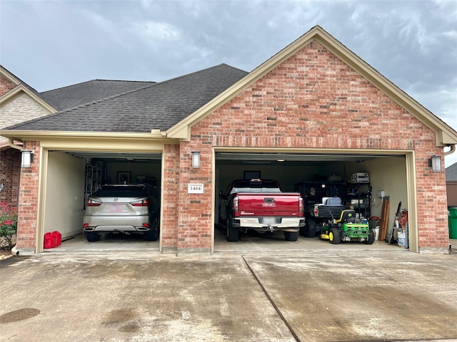 1464 S Bluebonnet Ln, Angleton, TX 77515 - garage with concrete driveway