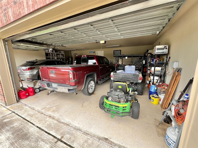 1464 S Bluebonnet Ln, Angleton, TX 77515 - garage with a garage door opener