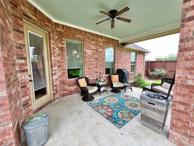 1464 S Bluebonnet Ln, Angleton, TX 77515 - view of patio with ceiling fan, grilling area, and an outdoor living space with a fire pit