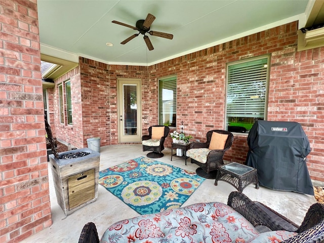 1464 S Bluebonnet Ln, Angleton, TX 77515 - view of patio featuring ceiling fan, a grill, and outdoor lounge area