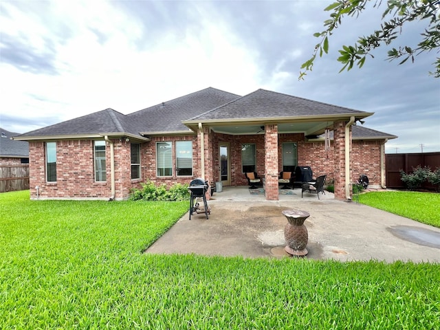 1464 S Bluebonnet Ln, Angleton, TX 77515 - rear view of property with a patio, a shingled roof, a fenced backyard, and brick siding